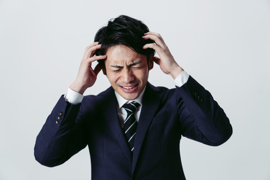 若い人が悩む画像